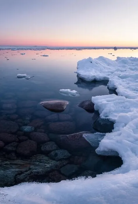 Framed Print : Tranquil winter sunset with melt sea and clean snow at beautiful peaceful evening in Finland Framed Print : Tranquil winter sunset with melt sea and clean snow at beautiful peaceful evening in Finland