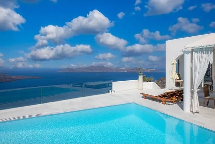 Framed Print : Travel vacation holiday banner. White houses, caldera, pool swimming in the town of Oia on the island of Santorini, panorama. Amazing scenic, luxury Framed Print : Travel vacation holiday banner. White houses, caldera, pool swimming in the town of Oia on the island of Santorini, panorama. Amazing scenic, luxury