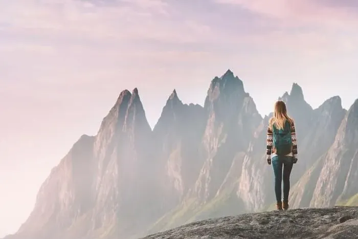 Framed Print : Traveler woman enjoying Okshornan peaks landscape in Norway travel lifestyle active vacation outdoor eco tourism Senja Framed Print : Traveler woman enjoying Okshornan peaks landscape in Norway travel lifestyle active vacation outdoor eco tourism Senja