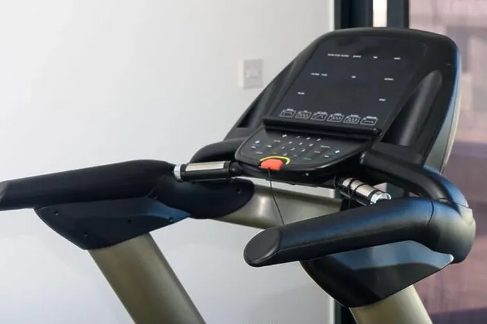Framed Print : Treadmill and Cross Trainers Side by Side in Gym Framed Print : Treadmill and Cross Trainers Side by Side in Gym