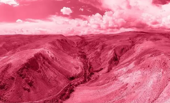 Framed Print : Trendy Color of the year 2023: Viva Magenta toned aerial drone view of eroded landform of Altai mountains Framed Print : Trendy Color of the year 2023: Viva Magenta toned aerial drone view of eroded landform of Altai mountains