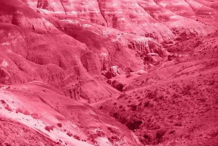 Framed Print : Trendy Color of the year 2023: Viva Magenta toned aerial drone view of eroded landform of Altai mountains Framed Print : Trendy Color of the year 2023: Viva Magenta toned aerial drone view of eroded landform of Altai mountains