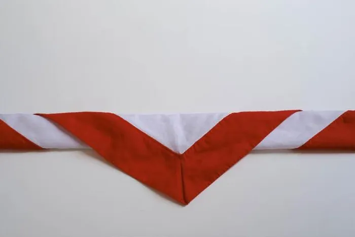 Framed Print : The triangular-shaped scarf that is worn as part of the uniform in the Indonesian Scout Movement Pramuka has red Framed Print : The triangular-shaped scarf that is worn as part of the uniform in the Indonesian Scout Movement Pramuka has red