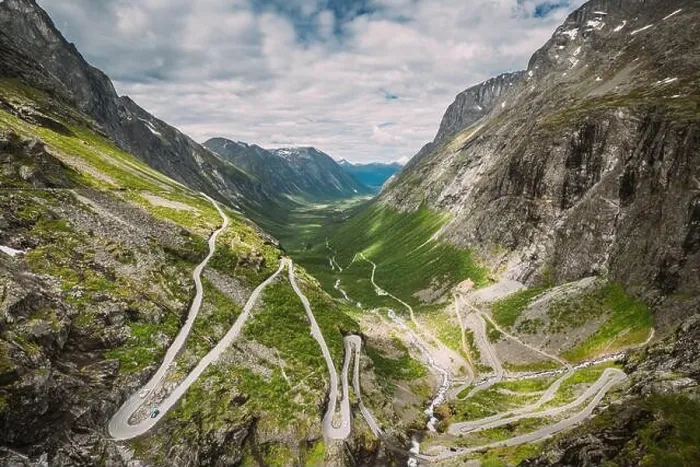 Framed Print : Trollstigen, Andalsnes, Norway. Cars Goes On Serpentine Mountain Road Trollstigen. Famous Norwegian Landmark And Popular Destination. Norwegian County Framed Print : Trollstigen, Andalsnes, Norway. Cars Goes On Serpentine Mountain Road Trollstigen. Famous Norwegian Landmark And Popular Destination. Norwegian County