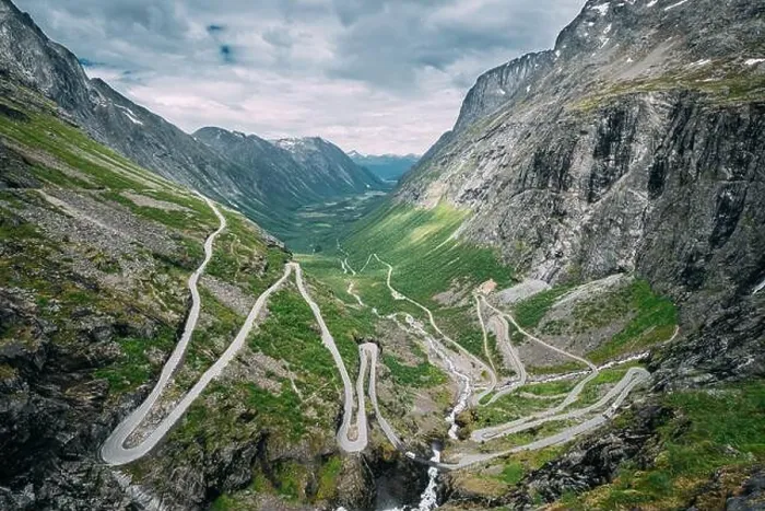 Framed Print : Trollstigen, Andalsnes, Norway. Cars Goes On Serpentine Mountain Road Trollstigen. Famous Norwegian Landmark And Popular Destination. Norwegian County Framed Print : Trollstigen, Andalsnes, Norway. Cars Goes On Serpentine Mountain Road Trollstigen. Famous Norwegian Landmark And Popular Destination. Norwegian County