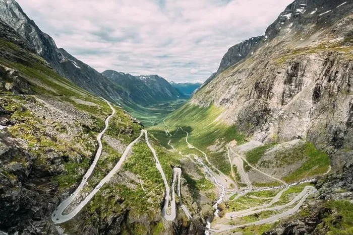 Framed Print : Trollstigen, Andalsnes, Norway. Serpentine Mountain Road Trollstigen. Famous Norwegian Landmark And Popular Destination. Norwegian County Road 63 In S Framed Print : Trollstigen, Andalsnes, Norway. Serpentine Mountain Road Trollstigen. Famous Norwegian Landmark And Popular Destination. Norwegian County Road 63 In S