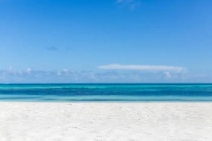 Framed Print : Empty tropical beach background. Horizon with sky and white sand. Paradise island shore or coast Framed Print : Empty tropical beach background. Horizon with sky and white sand. Paradise island shore or coast