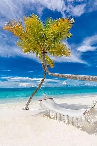 Tropical beach background as luxury summer landscape with beach swing or hammock and white sand and calm sea for beach. Perfect beach scene vacation
