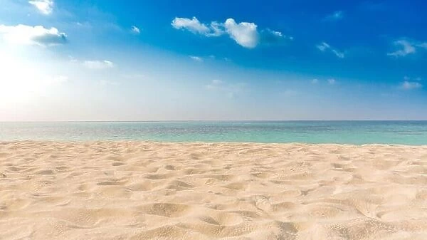Empty tropical beach. Sand and sky with nice sea view on the horizon