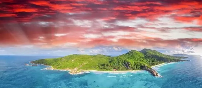Framed Print : Tropical beach with sea and palm taken from drone. Seychelles famous beach - aerial photo of La Digue Grand Anse Framed Print : Tropical beach with sea and palm taken from drone. Seychelles famous beach - aerial photo of La Digue Grand Anse