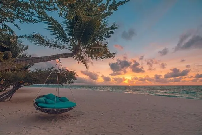 Framed Print : Tropical beach sunset landscape with beach swing or hammock and sunset sky white sand and calm sea for beach banner. Perfect beach scene vacation Framed Print : Tropical beach sunset landscape with beach swing or hammock and sunset sky white sand and calm sea for beach banner. Perfect beach scene vacation