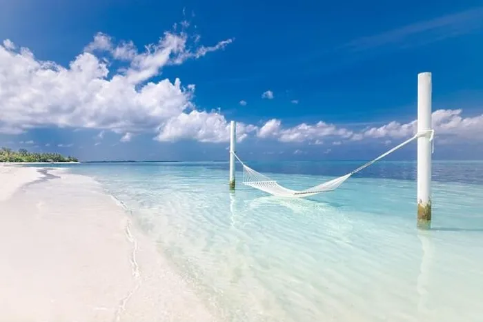 Framed Print : Tropical chill out, luxury beach with over water hammock endless sea view, exotic seascape. Summer vacation, holiday destination, relax and peaceful