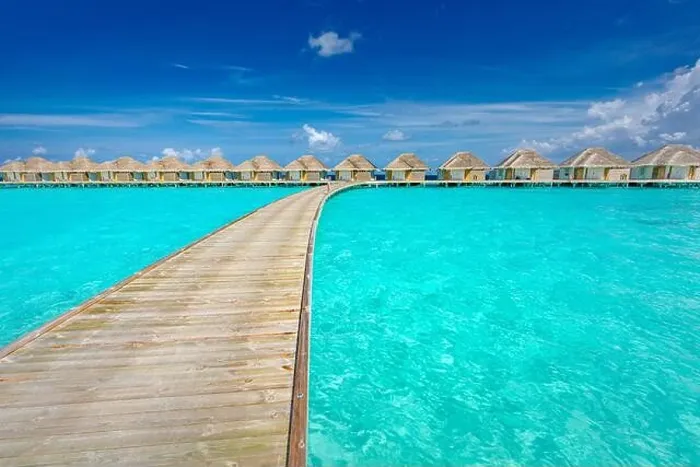 Framed Print : Tropical Maldives island with coconut palm tree, wooden bridge and water villa. Exotic travel landscape. Beautiful summer island paradise, peaceful Framed Print : Tropical Maldives island with coconut palm tree, wooden bridge and water villa. Exotic travel landscape. Beautiful summer island paradise, peaceful