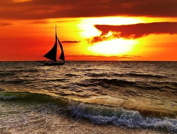 Tropical sunset with sailboat, Boracay, Philippines