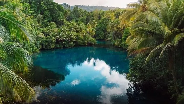 Framed Print : Tropical transparent lake with crystal blue fresh water in jungle forest on Sulawesi, Indonesia. Aerial view Framed Print : Tropical transparent lake with crystal blue fresh water in jungle forest on Sulawesi, Indonesia. Aerial view