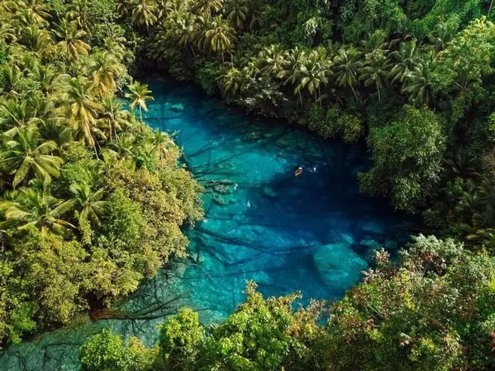 Framed Print : Tropical transparent lake with crystal blue fresh water in Sulawesi, Indonesia. Aerial view Framed Print : Tropical transparent lake with crystal blue fresh water in Sulawesi, Indonesia. Aerial view