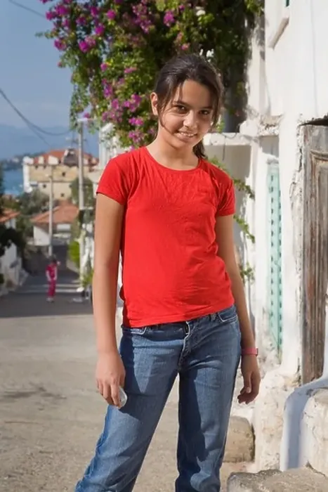 Framed Print : A Turkish young girl smiling in a street in Fethiye Turkey Framed Print : A Turkish young girl smiling in a street in Fethiye Turkey