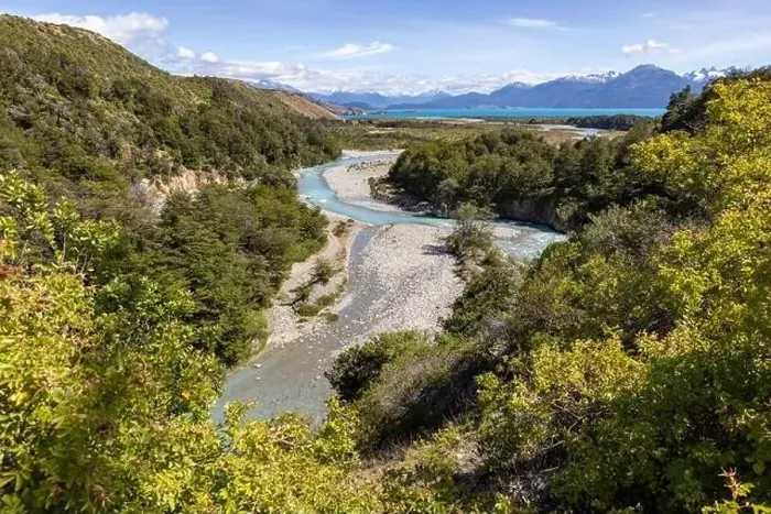 Framed Print : Turquoise creek flowing to the beautiful Lago General Carrera in southern Chile - Traveling the Carretera Austral Framed Print : Turquoise creek flowing to the beautiful Lago General Carrera in southern Chile - Traveling the Carretera Austral