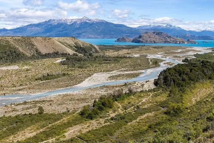 Framed Print : Turquoise creek flowing to the beautiful Lago General Carrera in southern Chile - Traveling the Carretera Austral Framed Print : Turquoise creek flowing to the beautiful Lago General Carrera in southern Chile - Traveling the Carretera Austral