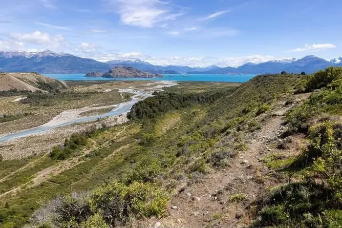 Framed Print : Turquoise creek flowing to the beautiful Lago General Carrera in southern Chile - Traveling the Carretera Austral Framed Print : Turquoise creek flowing to the beautiful Lago General Carrera in southern Chile - Traveling the Carretera Austral