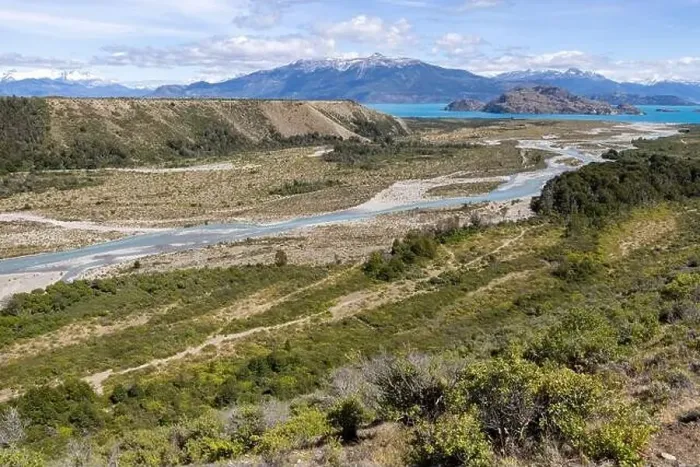 Framed Print : Turquoise creek flowing to the beautiful Lago General Carrera in southern Chile - Traveling the Carretera Austral Framed Print : Turquoise creek flowing to the beautiful Lago General Carrera in southern Chile - Traveling the Carretera Austral