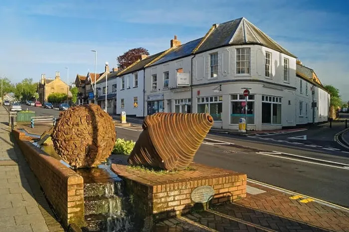 Framed Print : UK, Somerset, Chard, High Street, Ball & Whirl Sculptures Framed Print : UK, Somerset, Chard, High Street, Ball & Whirl Sculptures