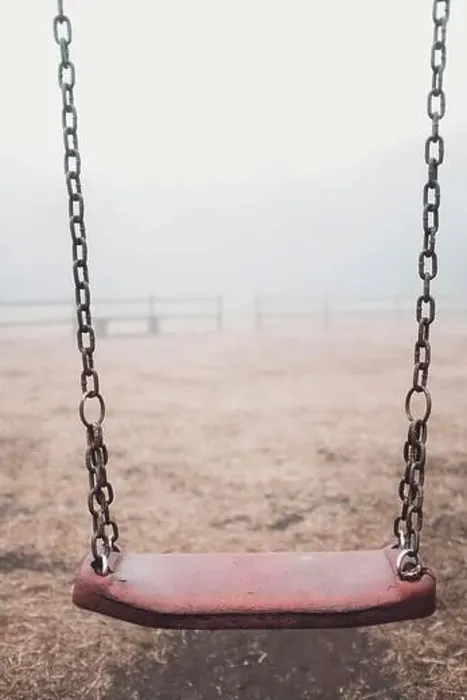 Framed Print : Ukrainian people against war. Scary empty swing at the park with fog in backgroind Framed Print : Ukrainian people against war. Scary empty swing at the park with fog in backgroind