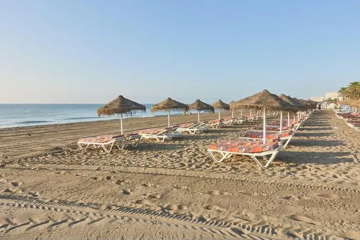 Framed Print : Umbrellas and hammocks on the beachfront of Los Alamos sandy beach in Torremolinos, Malaga, Andalusia, Spain Framed Print : Umbrellas and hammocks on the beachfront of Los Alamos sandy beach in Torremolinos, Malaga, Andalusia, Spain