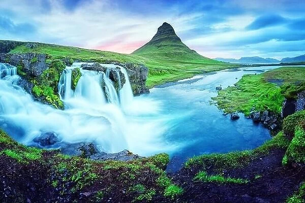 Unique landscape with Kirkjufellsfoss waterfall and Kirkjufell mountain, Iceland, Europe