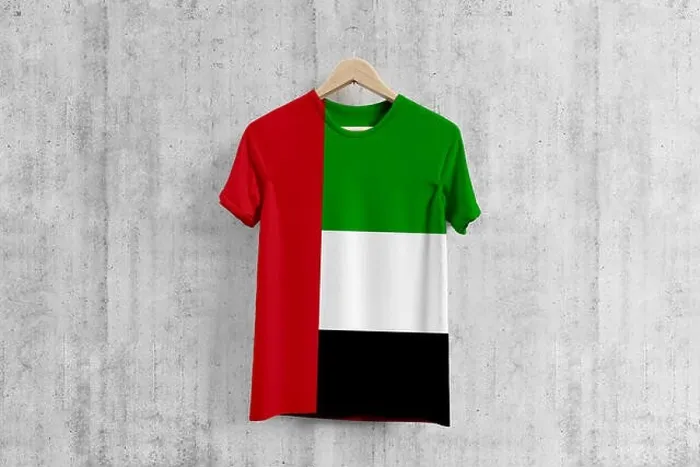 Framed Print : United Arab Emirates flag T-shirt on hanger, UAE team uniform design idea for garment production. National wear Framed Print : United Arab Emirates flag T-shirt on hanger, UAE team uniform design idea for garment production. National wear