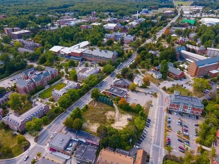 Framed Print : University of New Hampshire UNH Durham campus aerial view on Main Street in historic town center of Durham Framed Print : University of New Hampshire UNH Durham campus aerial view on Main Street in historic town center of Durham