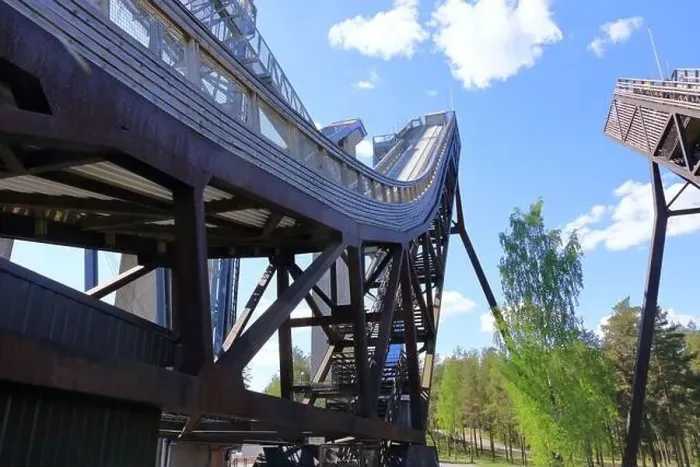 Framed Print : the upper part of the ski jumping facility ski jump towers in summer, Lahti in Finland
