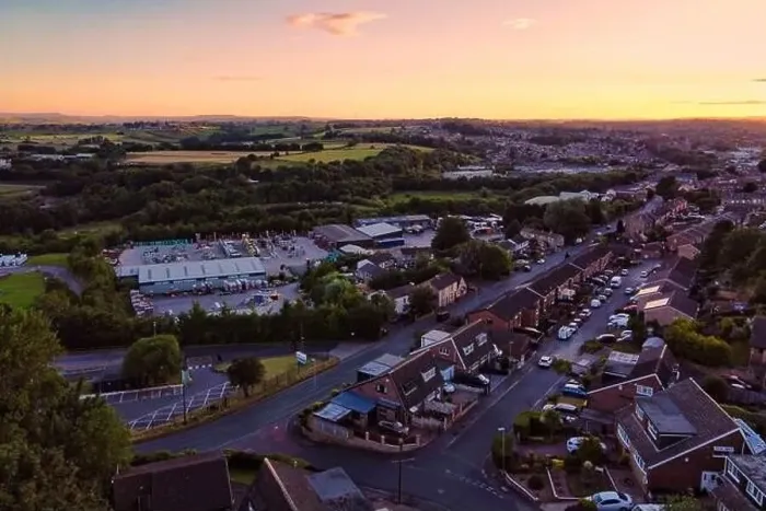 Framed Print : Urban Drone Image of Housing typical of the UK. Sunset with red brick houses and industrial area Framed Print : Urban Drone Image of Housing typical of the UK. Sunset with red brick houses and industrial area