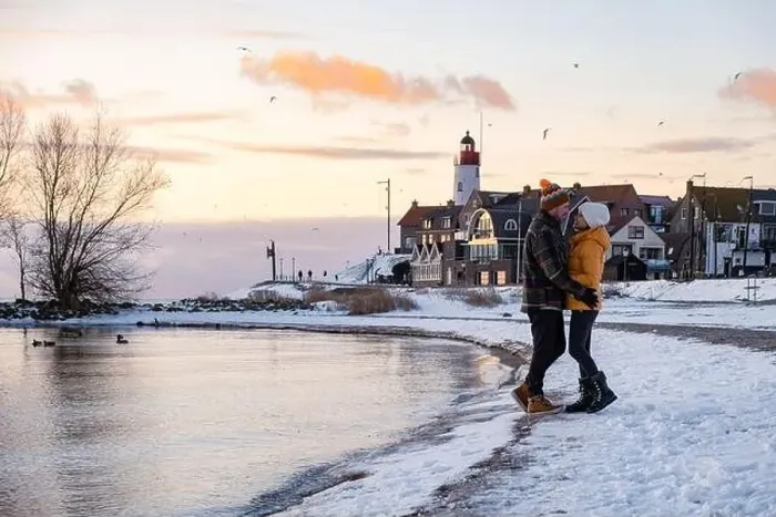 Framed Print : Urk Netherlands lighthouse during winter with snow covered coastline Framed Print : Urk Netherlands lighthouse during winter with snow covered coastline