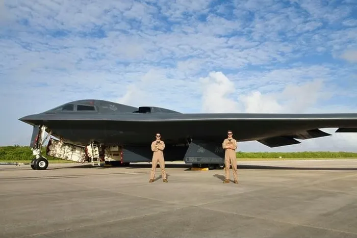 Framed Print : Two U.S. Air Force B-2 Spirit Stealth Bomber pilots pose with the Spirit of Ohio, an aircraft named after their home state Framed Print : Two U.S. Air Force B-2 Spirit Stealth Bomber pilots pose with the Spirit of Ohio, an aircraft named after their home state