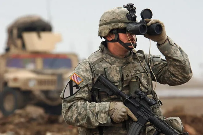 Framed Print : U.S. Army Pfc. Jason Dore looks for any possible enemy contact in western Baghdad Framed Print : U.S. Army Pfc. Jason Dore looks for any possible enemy contact in western Baghdad