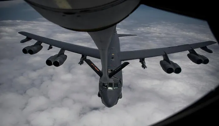 Framed Print : A U.S. B-52H Stratofortress aircraft assigned to the 20th Expeditionary Bomb Squadron refuels from a KC-135 Framed Print : A U.S. B-52H Stratofortress aircraft assigned to the 20th Expeditionary Bomb Squadron refuels from a KC-135