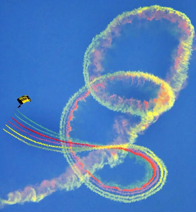 Framed Print : U.S. Navy Parachute Team fills the sky with colored smoke descent over downtown Los Angeles Framed Print : U.S. Navy Parachute Team fills the sky with colored smoke descent over downtown Los Angeles