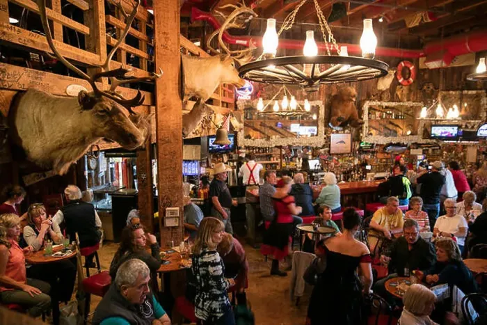Framed Print : USA, Alaska, Juneau, individuals gather and dine inside of the Red Dog Saloon in downtown Juneau Framed Print : USA, Alaska, Juneau, individuals gather and dine inside of the Red Dog Saloon in downtown Juneau