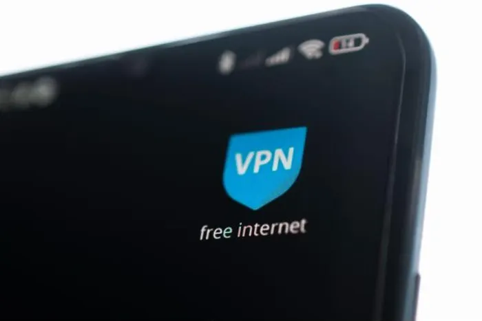 Framed Print : uses VPN application on smartphone Framed Print : uses VPN application on smartphone