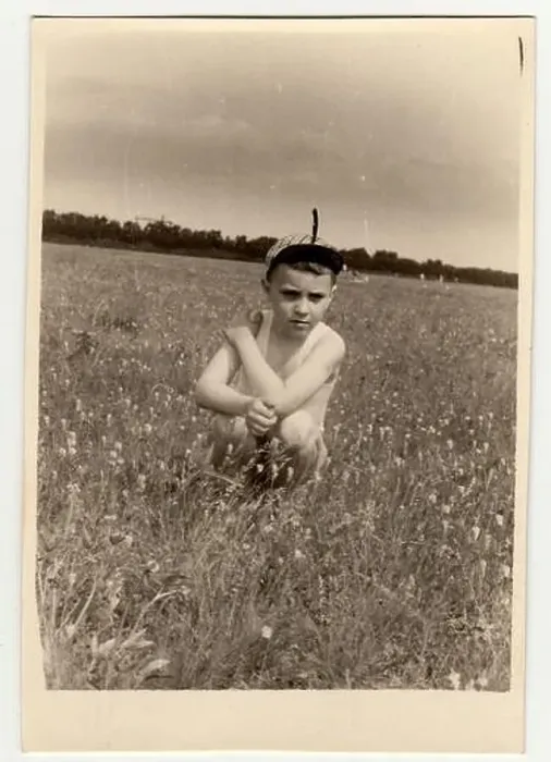 Framed Print : USSR - CIRCA 1980s: Vintage photo shows boy sits on meadow Framed Print : USSR - CIRCA 1980s: Vintage photo shows boy sits on meadow