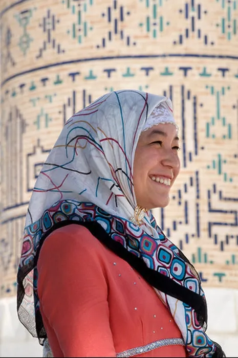 Framed Print : Uzbeki woman in distinctive Uzbeki attire outside Bibi Khanym Mosque, Samarkand, Uzbekistan Framed Print : Uzbeki woman in distinctive Uzbeki attire outside Bibi Khanym Mosque, Samarkand, Uzbekistan