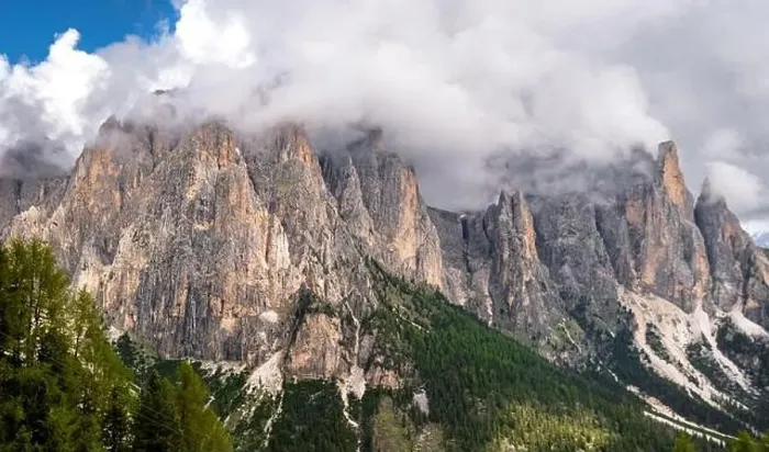 Framed Print : The Vajolet mountain range covered in clouds in the Dolemites in Italy Framed Print : The Vajolet mountain range covered in clouds in the Dolemites in Italy
