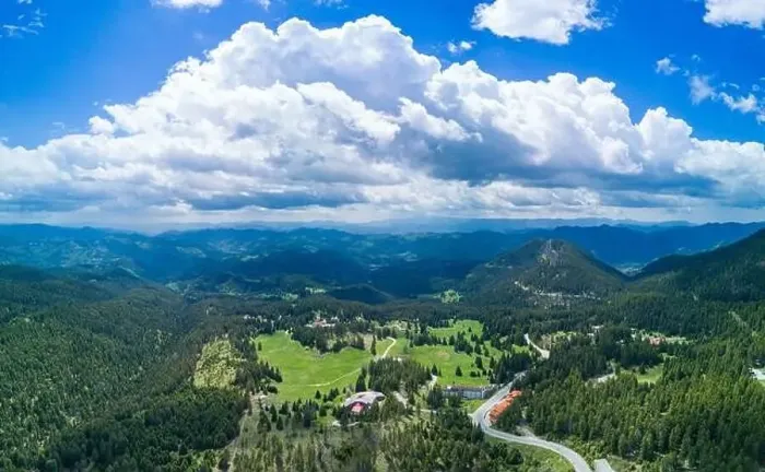 Framed Print : Valley of Balkan mountains with fog, sunny clouds and forests. Village Pamporovo. Panorama, top view Framed Print : Valley of Balkan mountains with fog, sunny clouds and forests. Village Pamporovo. Panorama, top view