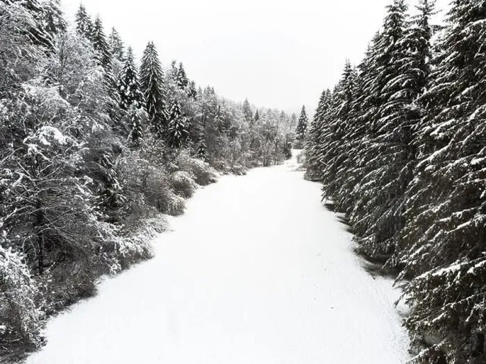 Framed Print : Valley with snow covered trees in winter. Aerial drone view Framed Print : Valley with snow covered trees in winter. Aerial drone view