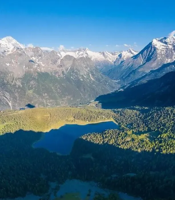 Framed Print : Valmalenco, alpine valley with Palù lake and wood in the summer season Framed Print : Valmalenco, alpine valley with Palù lake and wood in the summer season