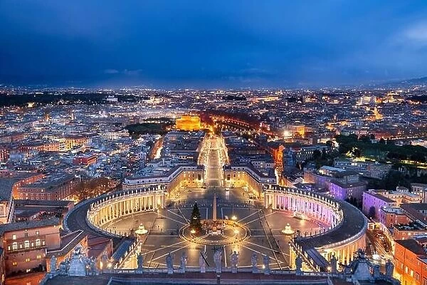 Vatican City overlooking St. Peter's Square surrounded by Rome, Italy at dusk
