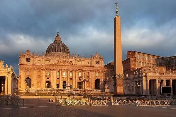 Vatican City, Rome, Italy. Cityscape image of illuminated Saint Peter's Basilica and St. Peter's Square, Vatican City, Rome, Italy at sunrise