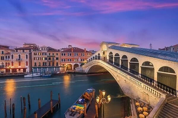 Venice, Italy at the Rialto Bridge over the Grand Canal at twilight