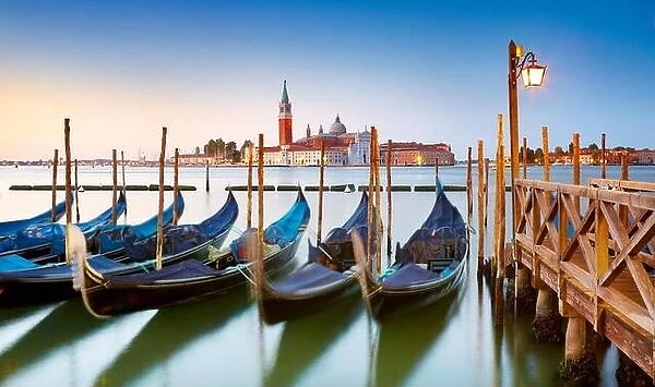 Venice, Italy - venetian gondola and San Giorgio Maggiore church UNESCO